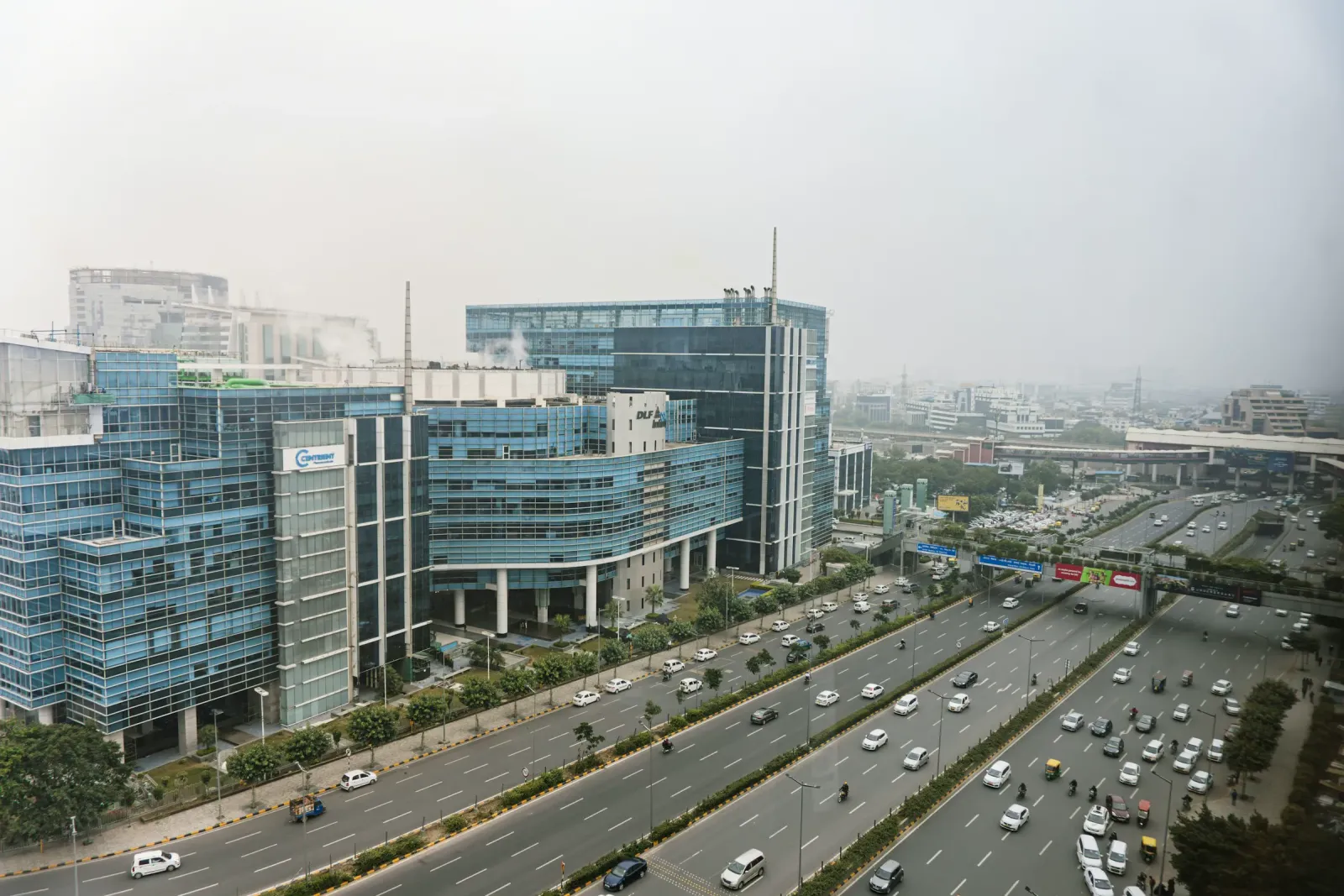 Office buildings beside a busy expressway