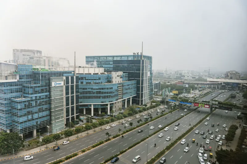 Office buildings beside a busy expressway
